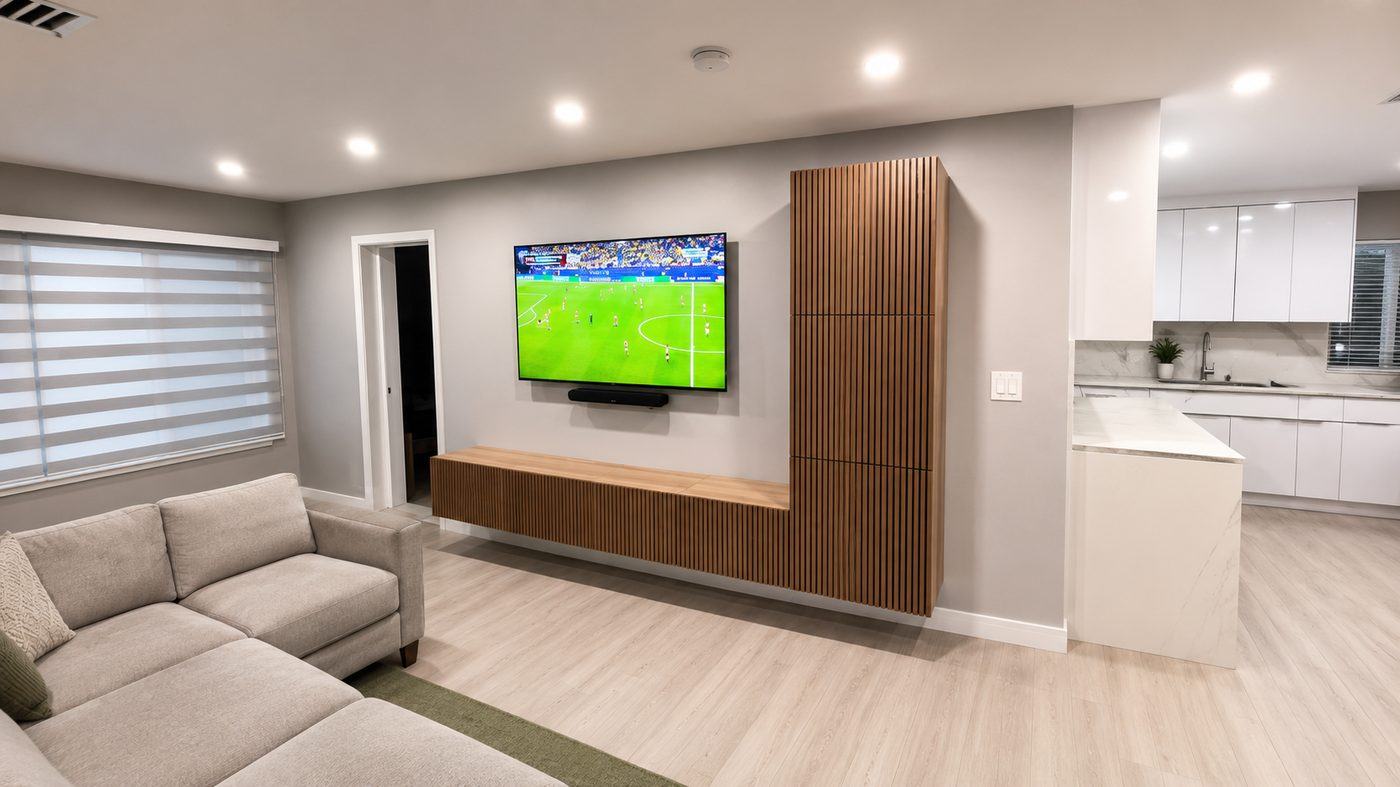 TV mounted flush on a media wall with cables fully concealed